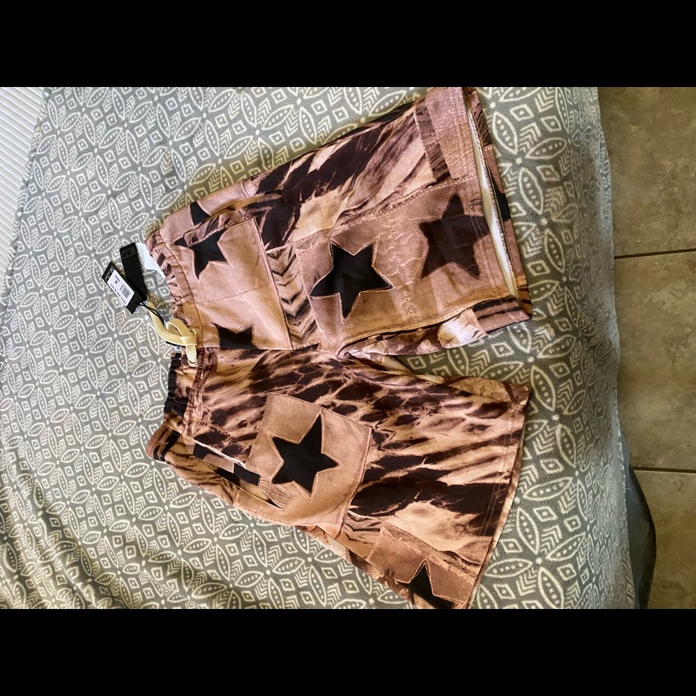 Bran new Mens Just Cavalli shorts, size medium